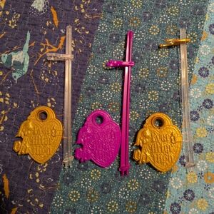 3 Ever After High Gold and Pink Heart-Shaped Doll Stands